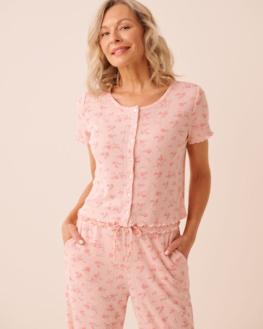 تيشيرت بنقشة زهور وحافة مكشكشة